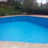 Impermeabilización de piscina comunitaria con poliurea en Robledo de Chavela Madrid.